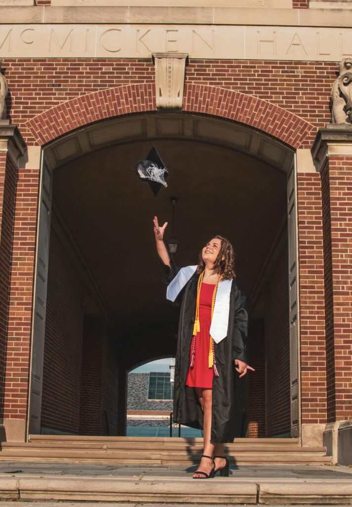 Woman Throwing Biretta at Graduation